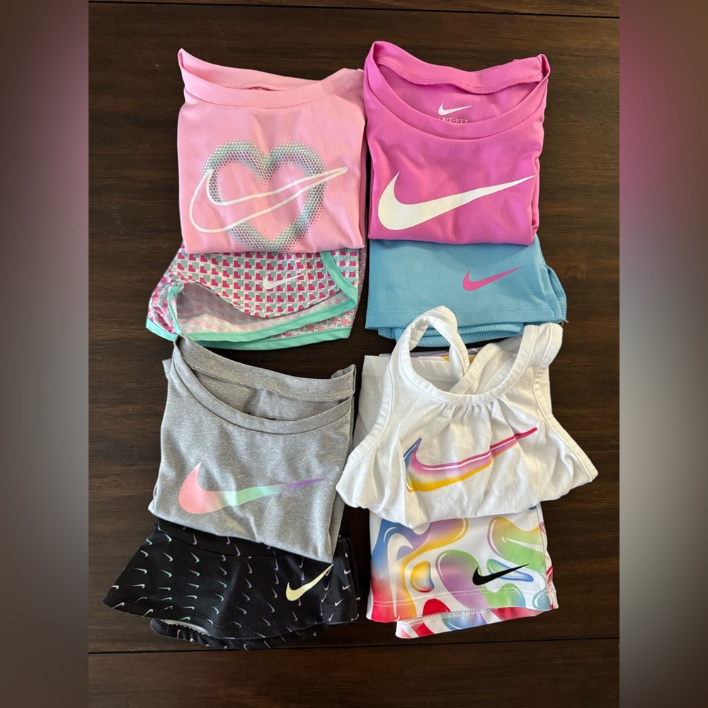 Nike bundle of skirt/short sets NWOT